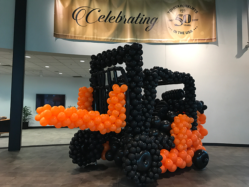 Toyota Material Handling U.S.A. celebrated 50 years in the U.S. in various ways, including life-sized balloon forklifts.(IMPO photo)