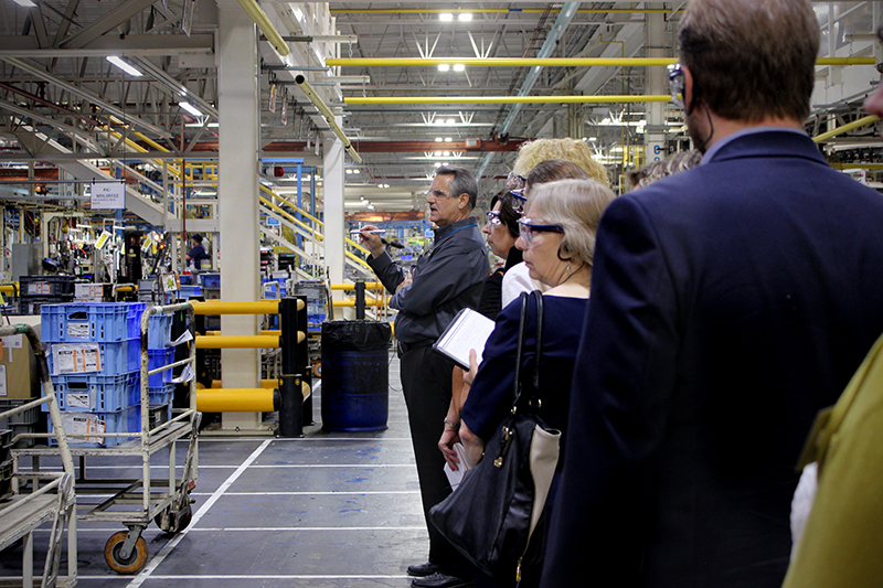 TMHU National Manager of Training and the National Customer Center, Thomas Lego, gives a tour of the TIEM facility. (Toyota photo)