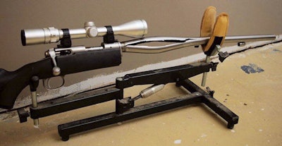 In this 2009 photo provided by Trent Procter, a Savage Arms stainless steel 10ML-II muzzleloader owned by Procter of Swan River, Manitoba, Canada, is displayed weeks after its barrel exploded and severely injured his left hand. Savage Arms recently agreed to pay a confidential settlement to Procter to resolve his lawsuit, one of several that allege the company kept a defective firearm on the market. (Gordon Harris/Trent Procter via AP)