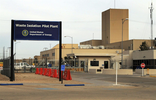 This March 6, 2014 file photo shows the idled Waste Isolation Pilot Plant, the nation's only underground nuclear waste repository, near Carlsbad, N.M. Officials at the nation's only underground nuclear waste repository are flipping the switch on an interim ventilation system this week, allowing mining to resume for the first time since a 2014 radiation release contaminated part of the facility.(AP Photo/Susan Montoya Bryan, File)