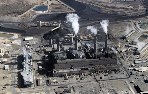 This Nov. 9, 2009, file photo shows the coal-fired San Juan Generating Station near Farmington, N.M. (AP Photo/Susan Montoya Bryan, File)