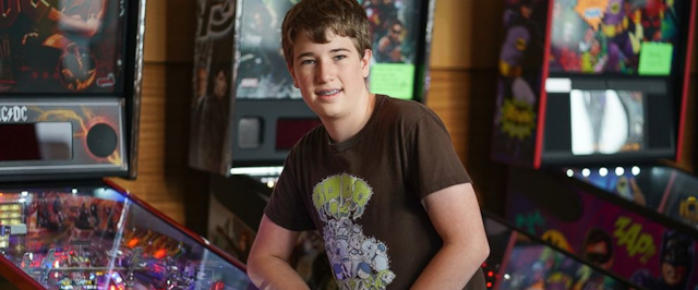 In this Oct. 13, 2017 photo, Escher Lefkoff poses for a photo at the Pinball Expo 2017 in Chicago. Lefkoff won the Professional and Amateur Pinball Association's World Championships last spring. Interest in pinball has skyrocketed over the last decade or so, with the number of players and competitions growing worldwide, according to the International Flipper Pinball Association, or IFPA. (AP Photo/Teresa Crawford)