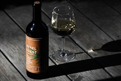 This Friday, Dec. 22, 2017, photo shows a bottle of Rebel Coast Winery's cannabis-infused wine in Los Angeles. As the world's largest legal recreational marijuana market takes off in California, the trendsetting state is set to ignite the cannabis-culinary scene. Rebel Coast Winery’s THC-infused sauvignon blanc is made from Sonoma County grapes, but the alcohol is removed in compliance with regulations that prohibit mixing pot with alcohol. (AP Photo/Jae C. Hong)