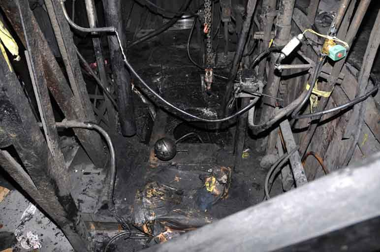 This Aug. 1, 2011, photo provided by the Texas Peace Officers shows the vehicle at the scene of the rural West Texas crash that killed Kerrybeth Hall and Matthew Smith. Police listed a Goodyear Wrangler SilentArmor tire – among more than 40,000 tires the company later recalled – as a cause of the crash. (Texas Peace Officers/Reveal from the Center for Investigative Reporting via AP)