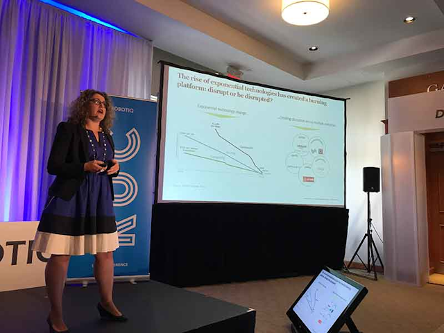 Michelle Drew Rodriguez, Deloitte Manufacturing Leader, gives her keynote address at RUC 2017. (Robotiq photo)
