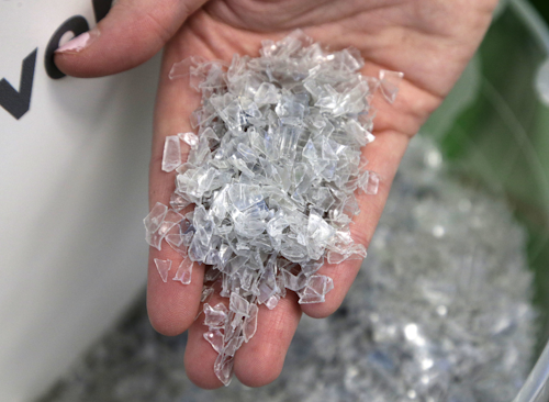 In this Thursday, Oct. 13, 2016, file photo, recycled plastic chips destined to be made in to thread are shown at the Repreve Bottle Processing Center, part of the Unifi textile company in Reidsville, N.C. On Wednesday, Jan. 3, 2018, the Institute for Supply Management, a trade group of purchasing managers, issues its index of manufacturing activity for December. (AP Photo/Chuck Burton, File)