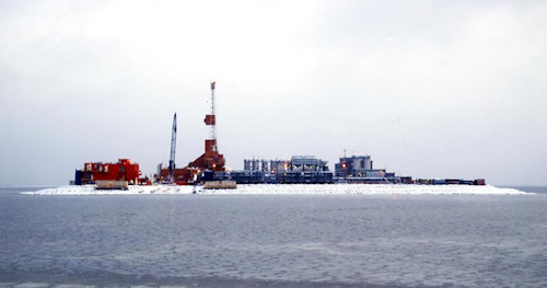 In this Oct. 17, 2017 file photo provided by the Bureau of Safety and Environmental Enforcement, oil production equipment appears on Spy Island, an artificial island in state waters of Alaska's Beaufort Sea. The Trump administration on Thursday, Jan. 4, 2018 moved to vastly expand offshore drilling from the Atlantic to the Arctic oceans with a plan that would open up federal waters off the Pacific coast for the first time in more than three decades. Alaska's Beaufort Sea is one of those areas. (Guy Hayes/Bureau of Safety and Environmental Enforcement via AP, File)