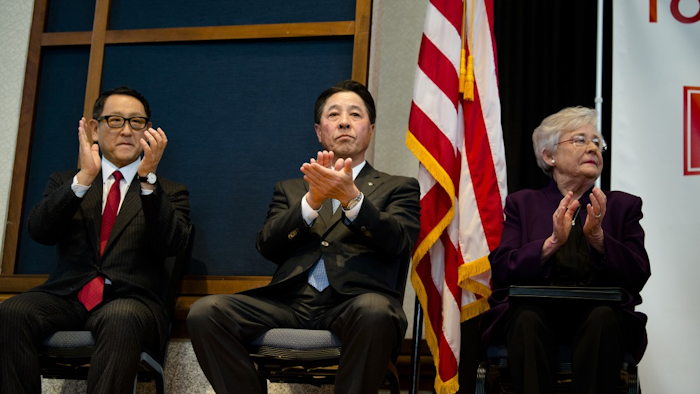 Alabama Gov. Kay Ivey, right, Masamichi Kogai, Mazda Motor Corp. president and CEO, and Akio Toyoda, Toyota Motor Corp. president, applaud during a press conference, Wednesday, Jan. 10, 2018, in Montgomery, Ala., where the Japanese automakers announced plans to build a huge $1.6 billion joint-venture plant in Huntsville, that will eventually employ about 4,000 people. Several states had competed for the coveted project, which will be able to turn out 300,000 vehicles per year and will produce the Toyota Corolla compact car for North America and a new small SUV from Mazda. (Albert Cesare/The Montgomery Advertiser via AP)