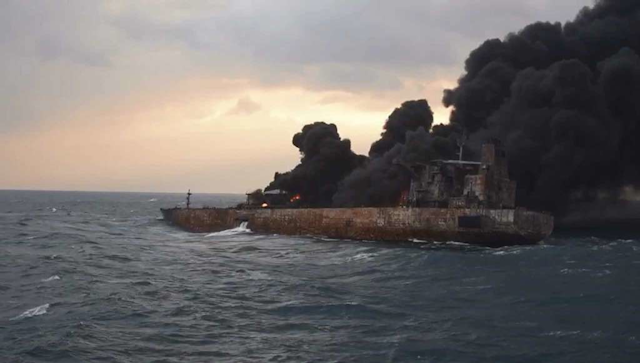 In this Thursday, Jan. 11, 2018, photo provided by China's Ministry of Transport, smoke rises from a fire aboard the oil tanker Sanchi in the East China Sea off the eastern coast of China. (Ministry of Transport via AP)