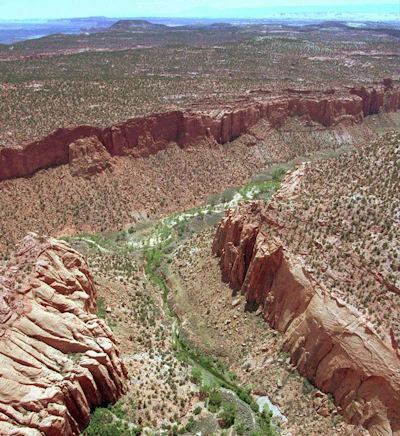 This May 30, 1997, file photo, shows the varied terrain of Grand Staircase-Escalante National Monument near Boulder, Utah. The window opened Friday, Feb. 2, 2018, for oil, gas, uranium and coal companies to make requests or stake claims to lands that were cut from two sprawling Utah national monuments by President Trump in December but there doesn't appear to be a rush to seize the opportunity. (AP Photo/Douglas C. Pizac, File)