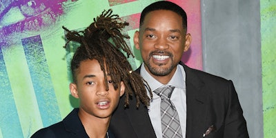 FILE - In this Aug. 1, 2016 file photo, Jaden Smith, left, and his father Will Smith attend the world premiere of 'Suicide Squad' in New York. The Smiths have founded an eco-friendly bottled-water company called Just, which is unveiling a new line of flavored waters next month. (Photo by Evan Agostini/Invision/AP, File)