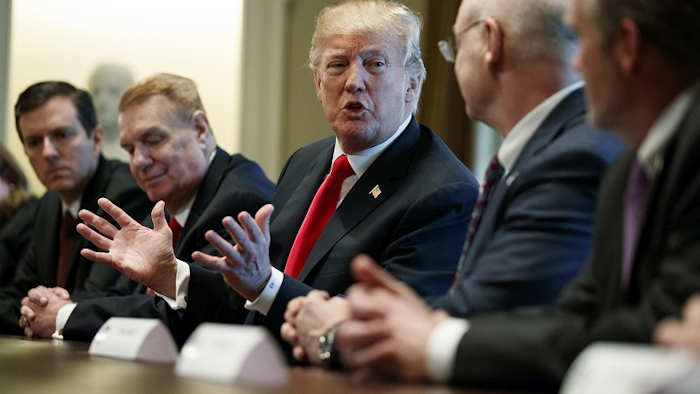 President Donald Trump speaks during a meeting with steel and aluminum executives in the Cabinet Room of the White House, Thursday, March 1, 2018, in Washington. From left, Roger Newport of AK Steel, John Ferriola of Nucor, Trump, Dave Burritt of U.S. Steel Corporation, and Tim Timkin of Timken Steel. Image credit: AP Photo/Evan Vucci