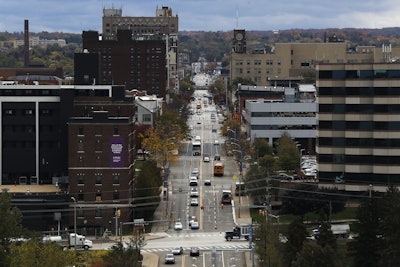 In this Oct. 24, 2017, photo, vehicles travel along State Street, the main thoroughfare through town, as seen from the Bicentennial Tower in Erie, Pa. Image credit: AP Photo/John Minchillo