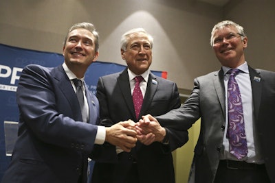 Canada's Minister of International Trade Francois-Philippe Champagne, Chile's Foreign Minister Heraldo Munoz and New Zealand's Trade Minister David Parker, pose for a photograpghers before a signing ceremony of the Comprehensive and Progressive Agreement for Trans-Pacific Partnership, CP-TPP, in Santiago, Chile, Thursday, March 8, 2018. Image credit: AP Photo/Esteban Felix