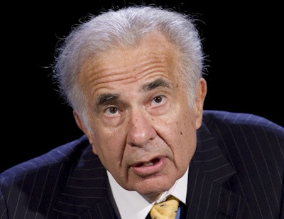 In this Oct. 11, 2007, file photo, activist investor Carl Icahn speaks at the World Business Forum in New York. Image credit: AP Photo/Mark Lennihan, File