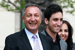 In this April 21, 2011 file photo shows MGA chief executive Isaac Larian, left, leaves federal court in Santa Ana, Calif., after a victory over Mattel Inc. Image credit: AP Photo/Christine Cotter, File