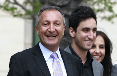 In this April 21, 2011 file photo shows MGA chief executive Isaac Larian, left, leaves federal court in Santa Ana, Calif., after a victory over Mattel Inc. Image credit: AP Photo/Christine Cotter, File