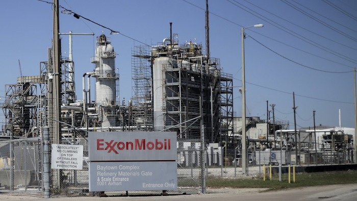 This March 20, 2018 photo shows Exxon Mobil Corp.'s Olefins Plant in Baytown, Texas. Two days after Harvey hit, some 457 million gallons of stormwater mixed with untreated wastewater, including oil and grease, surged into an adjacent creek from the Exxon plant. Image credit: Elizabeth Conley/Houston Chronicle via AP