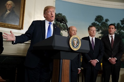 President Donald Trump speaks before he signs a presidential memorandum imposing tariffs and investment restrictions on China in the Diplomatic Reception Room of the White House, Thursday, March 22, 2018, in Washington. Image credit: AP Photo/Evan Vucci