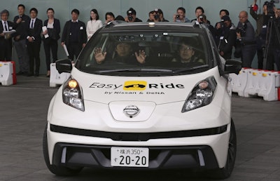 In this Feb. 23, 2018, file photo, Nissan Motor Co.'s Easy Ride robo-vehicle moves during a test ride in Yokohama, near Tokyo. Nissan's chief planning officer said Friday the Japanese automaker does not plan to change its road tests for self-driving vehicles after the recent fatal accident of an Uber autonomous vehicle. Image credit: AP Photo/Koji Sasahara, File