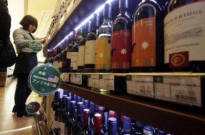 In this Jan. 30, 2011, file photo, wine imported from the U.S. is displayed at a supermarket in Beijing. Image credit: AP Photo/Ng Han Guan, File