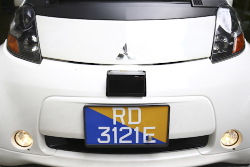 This Aug. 24, 2016, file photo shows a Lidar, that detects obstacles using laser sensors, installed above the car plate of an autonomous vehicle during its test drive in Singapore. Image creditL AP Photo/Yong Teck Lim, File