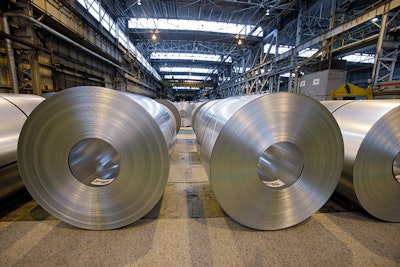 In this Feb. 15, 2013, file photo, finished galvanized steel coils await shipment at ArcelorMittal Steel's hot dip galvanizing line in Cuyahoga Heights, Ohio. President Donald Trump’s tariffs are expected to raise prices for steel and aluminum in this country. That will help domestic producers and could create several hundred new steelworker jobs. (AP Photo/Mark Duncan, File)