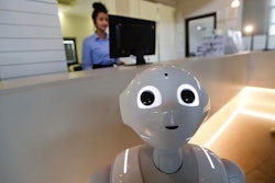 In this photo dated March 12, 2018, robot Robby Pepper stands at the front desk of hotel in Peschiera del Garda, northern Italy, Monday, March 12, 2018.Image credit: AP Photo/Luca Bruno