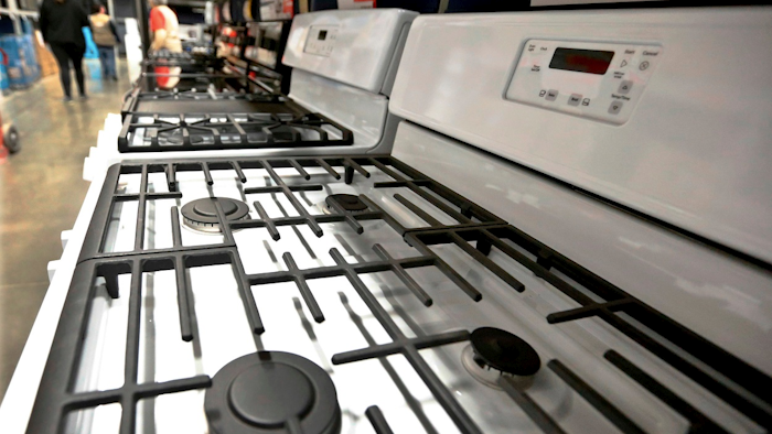 In this April 11, 2018, photo, a customer looks over a selection of stoves that are available for sale at a big box store in Cranberry Township, Pa. Image credit: AP Photo/Keith Srakocic