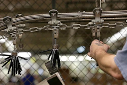 In this Monday, April 16, 2018, photo SKILCRAFT government pens are prepared transported by machinery through the production line at the Industries of the Blind in Greensboro, N.C. Image credit:AP Photo/Gerry Broome