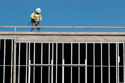 In this Oct. 6, 2017, file photo, workers build an apartment and retail complex in Nashville, Tenn. Image credit: AP Photo/Mark Humphrey, File