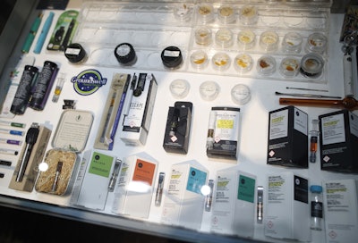Products sit in a case inside Ground Swell cannabis dispensary in east Denver. America's marijuana supporters have a lot to celebrate on this 420 holiday: Thirty states have legalized some form of medical marijuana, according to a national advocacy group. Nine of those states and Washington, D.C., also have broad legalization where adults 21 and older can use pot for any reason. Michigan could become the 10th state with its ballot initiative this year. Yet cannabis remains illegal under federal law, and it still has many opponents. (AP Photo/David Zalubowski)