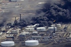In this April 26, 2018, file frame from video smoke rises from the Husky Energy oil refinery after an explosion and fire at the plant in Superior, Wis. Image credit: KSTP-TV via AP, File