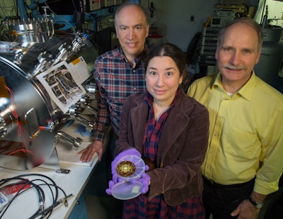 John Hagopian (left) collaborated with instrument scientist Lucy Lim to develop a new instrument that relies on carbon nanotubes to provide the electrons needed to excite minerals contained in an extraterrestrial sample. Larry Hess (right) patterns all the leads and patches where the catalyst for growing nanotubes is deposited. Image credit: NASA's Goddard Space Flight Center/Bill Hrybyk