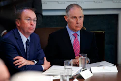 Director of the Office of Management and Budget Mick Mulvaney, left, and Environmental Protection Agency administrator Scott Pruitt listen to President Donald Trump speak during a cabinet meeting at the White House, Wednesday, May 9, 2018, in Washington. Image credit: AP Photo/Evan Vucci
