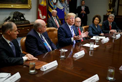 President Donald Trump speaks during a meeting with automotive executives in the Roosevelt Room of the White House, Friday, May 11, 2018, in Washington. From left, Environmental Protection Agency administrator Scott Pruitt, Ford CEO James Hackett, Trump, White House chief economic adviser Larry Kudlow, Secretary of Transportation Elaine Chao, and Nissan Motor Company senior vice president Scott Becker. Image credit: AP Photo/Evan Vucci