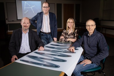 University of Illinois researchers Philippe Geubelle, left, Scott White, Nancy Sottos and Jeffrey Moore have developed a new polymer-curing process that could reduce the amount of time and energy consumed compared with the current manufacturing process. Image credit: L. Brian Stauffer