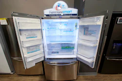In this July 20, 2017, file photo, the Kenmore Elite Smart French Door Refrigerator appears on display at a Sears store in West Jordan, Utah. In a move announced Monday, May 14, Sears Holdings Corp. says a special committee of its board is starting a formal process to explore the sale of its Kenmore brand and related assets. Image credit: AP Photo/Rick Bowmer, File