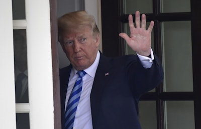 President Donald Trump waves to Uzbek President Shavkat Mirziyoyev as he leaves following a visit to the White House in Washington, Wednesday, May 16, 2018. Image credit: AP Photo/Susan Walsh