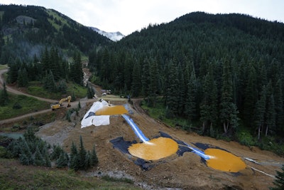 In this Aug. 12, 2015, file photo, water flows through a series of retention ponds built to contain and filter out heavy metals and chemicals from the Gold King Mine spill near Silverton, Colo. Image credit: (AP Photo/Brennan Linsley, File