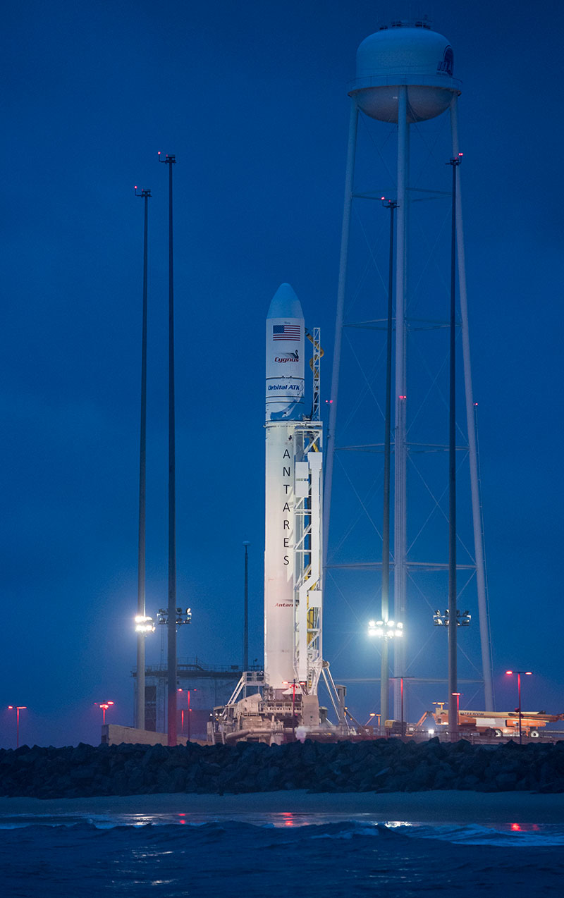 The Orbital ATK Antares rocket, with the Cygnus spacecraft onboard, is seen at launch Pad-0A, at sunrise Sunday, May 20, 2018 at Wallops Flight Facility in Virginia. The Antares will launch with the Cygnus spacecraft filled with 7,400 pounds of cargo for the International Space Station, including science experiments, crew supplies, and vehicle hardware. The mission is Orbital ATK's ninth contracted cargo delivery flight to ISS for NASA. (Aubrey Gemignani/NASA via AP)