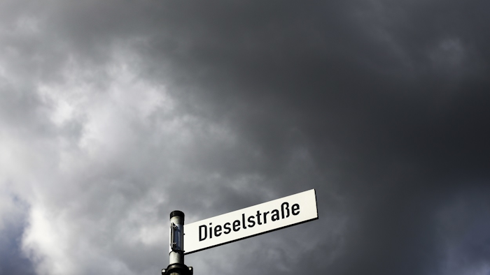 The Sept. 29, 2015 photo shows the street sign of the Dieselstrasse (Diesel Street) in Wolfsburg, Germany. Image credit: AP Photo/Markus Schreiber, file