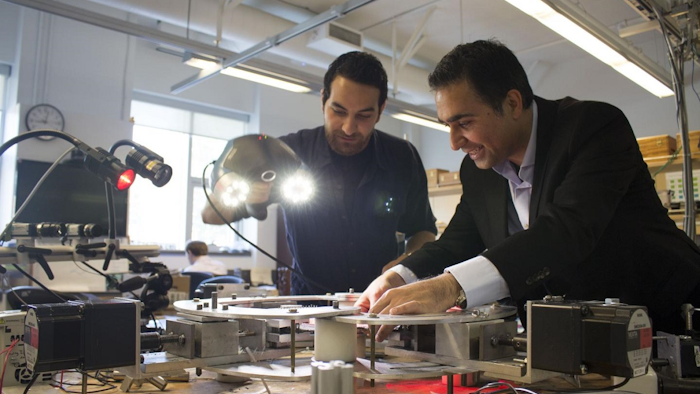 Engineering professor Abbas Milani and graduate student Armin Rashidi use 3D scanning equipment to analyze textile composites. Image credit: UBC Okanagan