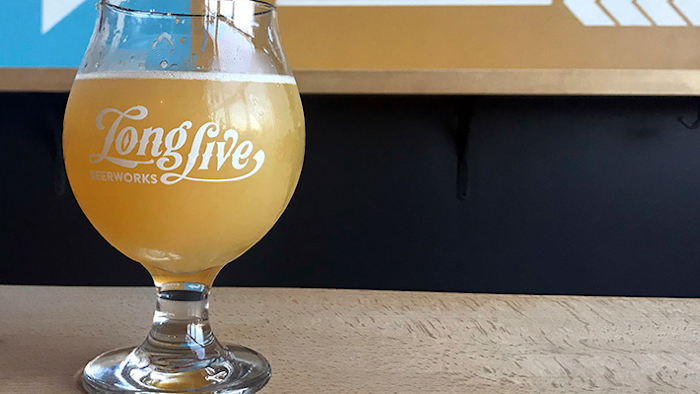 This Thursday, May 24, 2018 photo shows a craft beer at Long Live Beerworks in Providence, R.I. There is cause for hoppy optimism in the nation's smallest state, where lawmakers in 2016 moved to alleviate a harsh regulatory environment for craft beer manufacturers. The state could see record growth this year. Rhode Island saw a higher proportional increase in brewery licenses from 2016 to 2017 than any other state besides Oklahoma, according to federal data. (AP Photo/Dylan McGuinness)