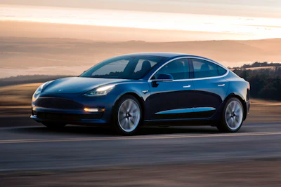 This photo provided by Tesla shows a 2017 Tesla Model 3, a vehicle that has a semiautonomous driving system called Autopilot. Tesla can update the Autopilot software over the air, not necessitating a trip to a service center. Tesla offers Autopilot on its Model S, Model X and Model 3 vehicles. (Courtesy of Tesla via AP)