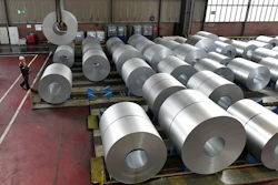 In this April 27, 2018, file photo, steel coils are stored at the Thyssenkrupp steel factory in Duisburg, Germany. Duisburg is the biggest steel producer site in Europe. Image credit: AP Photo/Martin Meissner, File