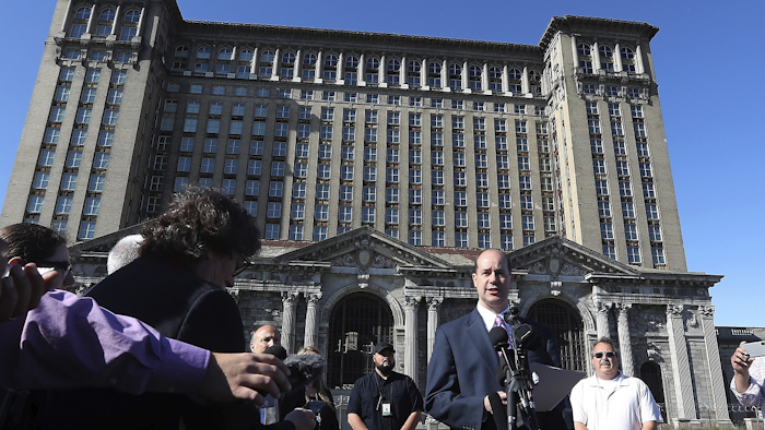 Matthew Moroun, son of Michigan Central Station owner Manuel 'Matty' Moroun announces the sale of the historic train station to the Ford Motor Co., for redevelopment, Monday, June 11, 2018, in Detroit. Image credit: AP Photo/Carlos Osorio