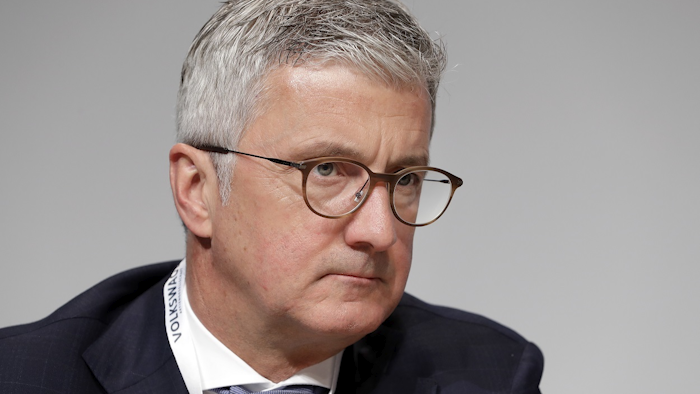In this Thursday, May 3, 2018 file photo, Rupert Stadler, CEO of Audi AG, attends the shareholders' meeting of the Volkswagen stock company in Berlin, Germany. Image credit: AP Photo/Michael Sohn, file