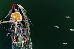 A fishing trawler makes its way through the inlet into Lake Montauk to bring its catch to one of three commercial docks in Montauk, N.Y., on Tuesday, Dec. 19, 2017. Image credit: AP Photo/Julie Jacobson