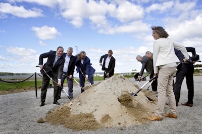 Swedish Prime Minister Prime Minister Stefan Lofven, Bengt Kjell, Chairman of the Board SSAB, Marten Gornerup, CEO Hybrit, Jan Mostrom, CEO LKAB, Magnus Hall, CEO Vattenfall, Martin Lindqvist, CEO SSAB, Réni Kolessar, Research Director of Energy Agency and Isabella Lovin Minister for International Development Cooperation and Climate, and Deputy Prime Minister, from left, take part in a ceremony marking the construction of pilot plant for fossil-free steel production, a collaboration between LKAB, Vattenfall and SSAB, in the SSAB industrial area in Lulea, Sweden Wednesday June 20, 2018. Image credit: Gustav Sjöholm/TT via AP